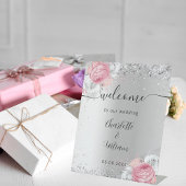 Table Fleurs roses argentées mariage signe de bienvenue