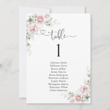 Tableau de numéros de table avec des roses roses p