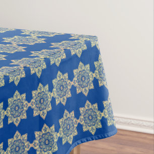 Tablecloth met gouden medaillons op blauw tafelkleed