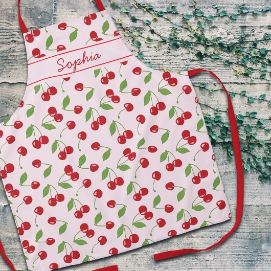 Tablier à motif de cerises avec nom rose pâle