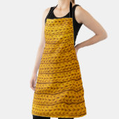Tablier A pattern of yellow knitted fabric of yarn. (Insitu)