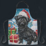 Tablier Affenpinscher Winter Wonderland Christmas Joie<br><div class="desc">Ce design festif reflète l'esprit joyeux de la période des fêtes, avec un adorable petit portant un chapeau de Père Noël. Le chien est niché dans un pays des merveilles hivernales, avec un bonhomme de neige, un sapin de Noël décoré et des cadeaux joliment emballés. Les flocons de neige tombent...</div>