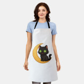 Tablier Chat noir souriant aux yeux verts brillants assis (Porté)