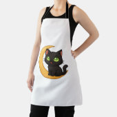 Tablier Chat noir souriant aux yeux verts brillants assis (Insitu)