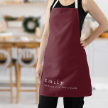 Tablier Citation minimaliste amusante Nom Bourgogne Noël<br><div class="desc">Citation Minimaliste Amusante Nom Bourgogne Noël. Une élégance simple avec ce design entièrement personnalisable. Personnalisez facilement avec votre nom et gardez la citation festive à thème en l'éclairant dans la cuisine ou changez au besoin. Le texte, l'arrière - plan et les sangles peuvent être changés en n'importe quelle couleur de...</div>