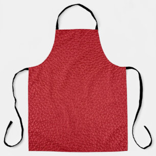 Tablier Closeup en cuir artificiel rouge foncé.