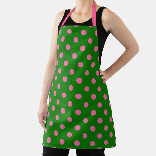 Tablier Conception de motif à pois rose sur fond vert