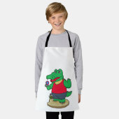 Tablier Crocodile aux fleurs (Porté)