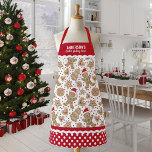 Tablier Cuisine de Noël biscuits cuite Apron de l'équipage<br><div class="desc">Un joli tablier d'équipage de cuisine de Noël décoré d'un motif de biscuits de pain d'épices. Personnalisez-le avec votre nom. Bordure de tablier a un motif de pois rouge et blanc avec ric rac. Fait un cadeau amusant pour Noël. Conçu pour vous par Blackberry Boulevard.</div>