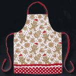 Tablier Cuite pain d'épices de Noël<br><div class="desc">Un motif de biscuits en pain d'épice de vacances décore cet tablier. Bordure de tablier a un motif de pois rouge et blanc avec ric rac. Fait un cadeau amusant pour Noël. Conçu pour vous par Blackberry Boulevard.</div>