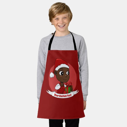 Tablier Cute Christmas baby with a present and Santa's hat (Porté)