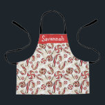 Tablier Cute rouge et blanc Sucre de canne Candies Motif<br><div class="desc">Motif de bonbons de Noël mignon avec des bonbons blancs et rouges et de la fausse parties scintillant avec nom personnalisable.</div>