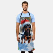 Tablier Dachshund Courir en neige avec Casquette de Noël (Porté)