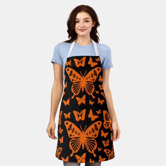 Tablier Danse papillon en orange (Porté)
