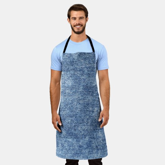 Tablier Dénim bleu lavement acide, texture de gros plan. (Porté)