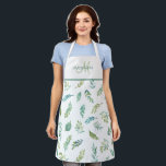Tablier Élégant Motif Monogramme, feuilles turquoise et ve<br><div class="desc">Ajoutez votre nom et votre initiale et faites de ce magnifique tablier votre propre nom! Exquise aquarelle verdure feuillage motif composé de différents types de feuilles dans un magnifique mélange de turquoise, turquoise, vert pâle et vert citron doux. Zone supérieure en blanc avec vous initial dans une douce chaux verte...</div>