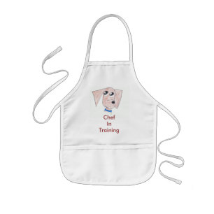 Tablier Enfant Le chef frais de chiot dans la formation badine le