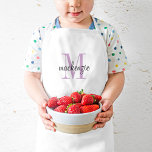 Tablier Enfant Monogramme violet initial et nom personnalisé<br><div class="desc">Tablier enfant sur mesure, parfait pour votre petit chef en formation ! Personnalisez-le avec son nom monographique et son texte initial ou autre texte personnalisé. Cliquez sur Customiser pour modifier les polices et les couleurs ou ajouter plus de texte ou d'images pour créer un cadeau spécial d'une nature. Également disponible...</div>