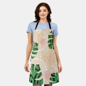 Tablier Feuilles Monstera sur rose. (Porté)