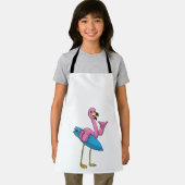 Tablier Flamant rose comme Surfer avec Surfboard (Insitu)