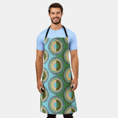 Tablier Fleurs pliées : motif rétro bleu-vert. (Porté)