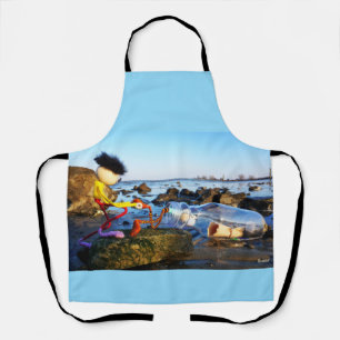 Tablier Fubby avec un siffleur en bord de mer.
