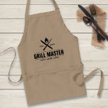 Tablier Funny BBBQ Grill Master Barbecue personnalisé King<br><div class="desc">Votre maître barbecue va adorer cet tablier personnalisé. La conception comprend une fourchette de barbecue croisée et un couteau avec une flamme au-dessus. Ajoutez le nom et l'année de votre Grill King ou supprimez-le (mariage, maison, etc.) Parfait pour votre foodie préféré, fête des pères, barbecue familial, réunion ou plaisir pour...</div>