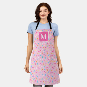 Tablier Glaçage rose et monogramme de paillettes de beigne