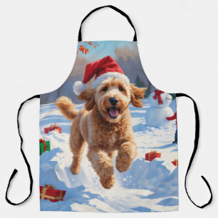 Tablier Goldendoodle courant dans la neige avec un chapeau