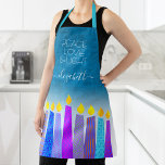 Tablier Hanoukka Menorah bougie Turquoise Paix Amour Lumiè<br><div class="desc">"Paix, amour et lumière." Voici une façon merveilleuse d’ajouter à l’amusement de votre cuisine de vacances. Ajoutez un éclat supplémentaire à vos aventures culinaires de vacances chaque fois que vous portez ce tablier Hanoukka étonnant, coloré et personnalisé. Une illustration ludique et artistique de bougies bleues à la menorah avec des...</div>