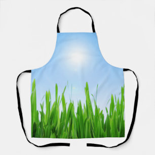 Tablier Jardin à l'herbe verte avec conception de ciel ble