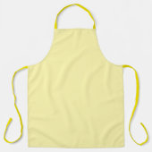 Tablier jaune clair présentant un design simple et (Recto)