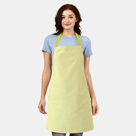 Tablier jaune clair présentant un design simple et (Porté)