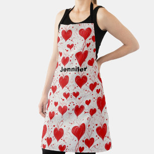 Tablier Joli rouge, coeur rose, monogramme de la Saint Val
