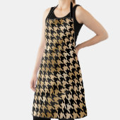 Tablier L'or métallique accroche la dent, motif de mode. (Insitu)