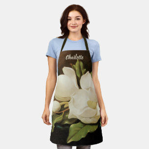 Tablier Magnolias géant sur un tissu de velours bleu par M