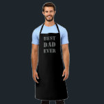 Tablier Meilleur papa Jamais noir & gris typographie moder<br><div class="desc">Meilleur papa Jamais noir et gris Typographie moderne grill barbecue cuisine Apron. Texte gris,  arrière - plan uni noir. Vérifiez que le reste de la collection correspond aux éléments de coordination correspondants.</div>