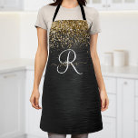 Tablier Monogramme à étincelle noire à Parties scintillant<br><div class="desc">Personnalisez facilement ce design élégant et branché de tablier avec une jolie parties scintillant dorée brillante sur un arrière - plan métallique brossé noir.</div>
