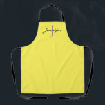 Tablier Monogramme moderne Jaune Noir Personnalisé<br><div class="desc">Montrez votre style avec ce Jaune Moderne Monogramme de Script Noir Personnalisé tablier. Il est conçu avec un arrière - plan tout-sur-impression jaune cool et l'initiale est en gris et le nom est en écriture manuscrite noire. Fabrique une idée de cadeau pour les femmes qui aiment faire cuire et cuire....</div>