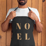 Tablier Noel noir et or | Noël tendance et élégant<br><div class="desc">Simple,  élégant et audacieux "Noel" citation tablier de vacances d'art en or élégant sur un arrière - plan noir luxe dans le style typographique minimaliste moderne. L'accueil peut être facilement personnalisé pour un design de vacances unique et personnel qui se démarque de la foule!</div>