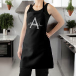 Tablier Noir Argent moderne Script Girl Monogramme Nom<br><div class="desc">Nom du monogramme noir et argent Apron. Cela rend le cadeau parfait pour 16 ans,  mariage,  douche nuptiale,  anniversaire,  baby shower ou bachelorette pour quelqu'un qui aime le luxe glam et les styles chic.</div>