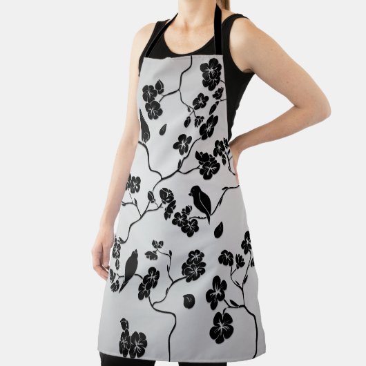 Tablier Noir sur les oiseaux Motifs en argent et fleurs de (Insitu)