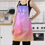 Tablier Nom de la fille Monogramme rose pourpre<br><div class="desc">Ce tablier girly est décoré avec un design atmosphérique dans les tons rose et violet et de script élégant. Facilement personnalisable avec votre nom et monogramme. Utilisez l'option Personnaliser supplémentaire pour modifier la taille,  le style ou la couleur du texte si vous le souhaitez.</div>