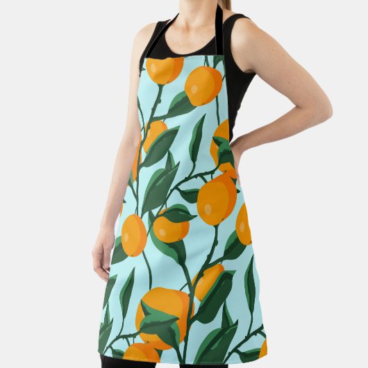 Tablier oranges sur branches de feuilles sans soudure moti (Insitu)