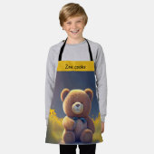 Tablier ours en peluche dans une prairie, enfants mignons (Porté)