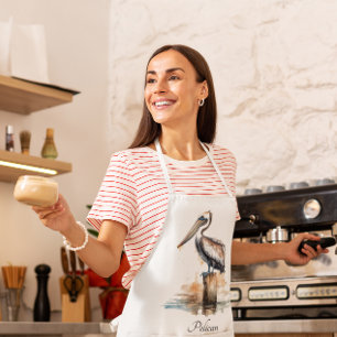 Tablier Pelican debout sur un poteau