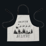 Tablier Père Noël croient Noël traditionnel beige photo<br><div class="desc">Père Noël croient Noël traditionnel vacances modernes élégante photo beige et noir favoriser la cuisson tablier cadeau design.</div>
