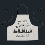 Tablier Père Noël croient Noël traditionnel beige photo<br><div class="desc">Père Noël croient Noël traditionnel vacances modernes élégante photo beige et noir favoriser la cuisson tablier cadeau design.</div>