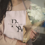 Tablier personnalisé Monogram Pastel Rose<br><div class="desc">Ajoutez une touche d'élégance à votre tenue de cuisine grâce à ce tablier personnalisé Monogram Pastel Pink. Doté d'une teinte rose pastel douce et d'un monogramme personnalisable, cet tablier est parfait pour ceux qui aiment cuisiner dans le style. Fabriqué avec des matériaux de haute qualité, il offre à la fois...</div>