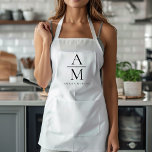 Tablier personnalisé Monogramme<br><div class="desc">Cuire dans le style avec ce tablier personnalisé Monogram. Doté d'un design élégant et d'un monogramme personnalisable, cet tablier ajoute une touche de sophistication à toute cuisine. Fabriqué à partir de matériaux durables et de haute qualité, il offre confort et protection, ce qui le rend parfait pour les chefs amateurs...</div>